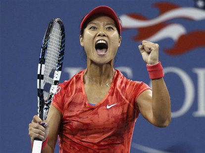 Li Na of China celebrates defeating Jelena Jankovic of Serbia at the U.S. Open tennis championships in New York September 1, 2013. REUTERS/A Li Na of China celebrates defeating Jelena Jankovic of Serbia at the U.S. Open tennis championships in New York September 1, 2013. REUTERS/A