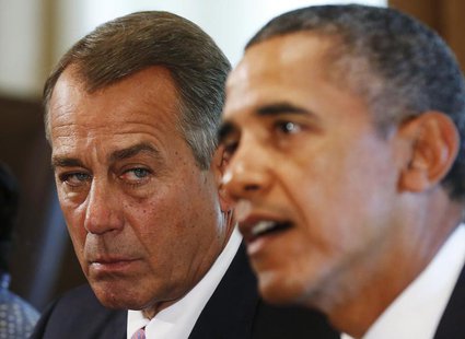 Speaker of the House John Boehner (R-OH) (L) listens to U.S. President Barack Obama during a meeting with bipartisan Congressional leaders i Speaker of the House John Boehner (R-OH) (L) listens to U.S. President Barack Obama during a meeting with bipartisan Congressional leaders i