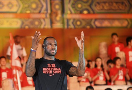 NBA basketball player LeBron James of the Miami Heat gestures as he attends a promotional event at the Imperial Ancestral Temple in Beijing, NBA basketball player LeBron James of the Miami Heat gestures as he attends a promotional event at the Imperial Ancestral Temple in Beijing,