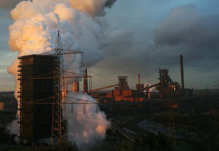 Steam rises at a coking plant at the steelworks of German steel maker ThyssenKrupp AG in Bruckhausen, a suburb of the western German city of Steam rises at a coking plant at the steelworks of German steel maker ThyssenKrupp AG in Bruckhausen, a suburb of the western German city of