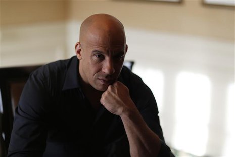 Actor Vin Diesel poses for a portrait while promoting his upcoming movie "Riddick" in Los Angeles, California August 27, 2013. REUTERS/Mario Actor Vin Diesel poses for a portrait while promoting his upcoming movie "Riddick" in Los Angeles, California August 27, 2013. REUTERS/Mario