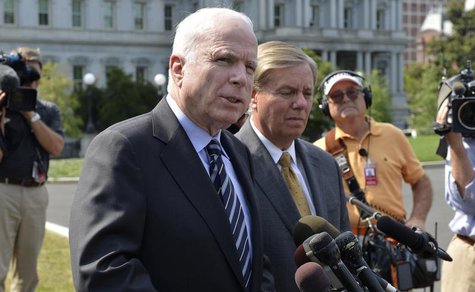 U.S. Senator John McCain (R-AZ), (L), makes remarks to the media as U.S. Senator Lindsey Graham (R-SC) listens, after meeting with U.S. Pres U.S. Senator John McCain (R-AZ), (L), makes remarks to the media as U.S. Senator Lindsey Graham (R-SC) listens, after meeting with U.S. Pres