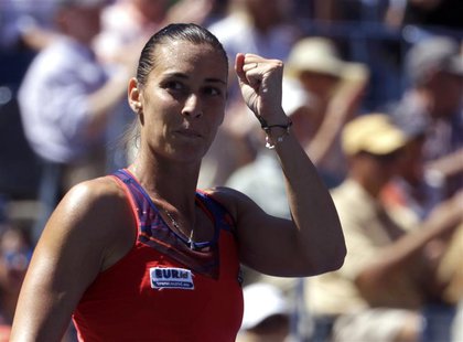Flavia Pennetta of Italy reacts after defeating compatriot Roberta Vinci at the U.S. Open tennis championships in New York September 4, 2013 Flavia Pennetta of Italy reacts after defeating compatriot Roberta Vinci at the U.S. Open tennis championships in New York September 4, 2013