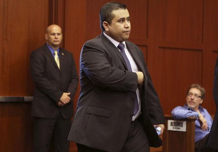 George Zimmerman enters the courtroom for his trial in Sanford, Florida July 13, 2013 during the trial of George Zimmerman in the shooting d George Zimmerman enters the courtroom for his trial in Sanford, Florida July 13, 2013 during the trial of George Zimmerman in the shooting d
