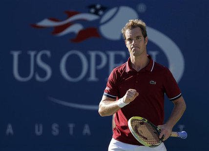 Richard Gasquet of France celebrates a point against David Ferrer of Spain at the U.S. Open tennis championships in New York September 4, 20 Richard Gasquet of France celebrates a point against David Ferrer of Spain at the U.S. Open tennis championships in New York September 4, 20