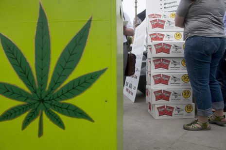 Festival goers are given bags of Doritos corn chips by Seattle Police Department officers during the Hempfest rally in downtown Seattle, Was Festival goers are given bags of Doritos corn chips by Seattle Police Department officers during the Hempfest rally in downtown Seattle, Was