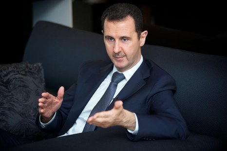 Syria's president Bashar al-Assad gestures during an interview with French daily Le Figaro in Damascus in this handout distributed by Syria' Syria's president Bashar al-Assad gestures during an interview with French daily Le Figaro in Damascus in this handout distributed by Syria'