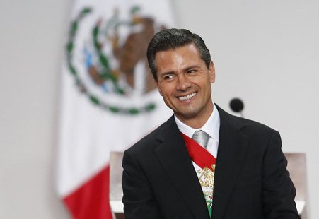 Mexico's President Enrique Pena Nieto smiles after his annual state of the union address in Mexico City September 2, 2013. REUTERS/Tomas Bra Mexico's President Enrique Pena Nieto smiles after his annual state of the union address in Mexico City September 2, 2013. REUTERS/Tomas Bra