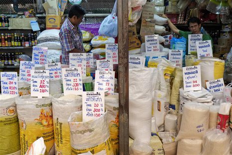 Thai rice vendors wait for customers at a market in central Bangkok, July 26, 2013. REUTERS/Athit Perawongmetha Thai rice vendors wait for customers at a market in central Bangkok, July 26, 2013. REUTERS/Athit Perawongmetha