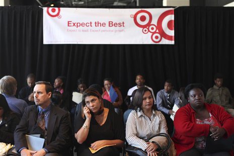 Job seekers wait to speak to a representative for the 300 available positions at a new Target retail store in San Francisco, California Augu Job seekers wait to speak to a representative for the 300 available positions at a new Target retail store in San Francisco, California Augu