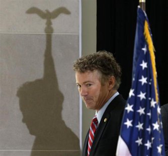 Senator Rand Paul (R-KY) leaves the podium after his speech to the Faith & Freedom Coalition Road to Majority Conference Kickoff Luncheon in Senator Rand Paul (R-KY) leaves the podium after his speech to the Faith & Freedom Coalition Road to Majority Conference Kickoff Luncheon in