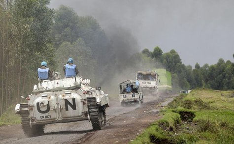 U.N. peacekeepers drive their tank as they patrol past the deserted Kibati village near Goma in the eastern Democratic Republic of Congo, Au U.N. peacekeepers drive their tank as they patrol past the deserted Kibati village near Goma in the eastern Democratic Republic of Congo, Au
