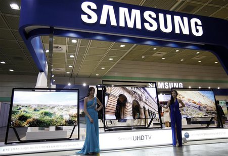 Models pose with Samsung Electronics' Ultra HD LCD televisions during World IT show 2013 at the Coex convention centre in Seoul May 22, 2013 Models pose with Samsung Electronics' Ultra HD LCD televisions during World IT show 2013 at the Coex convention centre in Seoul May 22, 2013