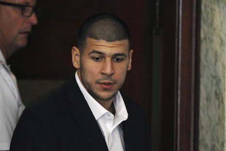 Former NFL New England Patriots tight end Aaron Hernandez, accused of killing 27-year-old semi-pro football player Odin Lloyd, is brought to Former NFL New England Patriots tight end Aaron Hernandez, accused of killing 27-year-old semi-pro football player Odin Lloyd, is brought to