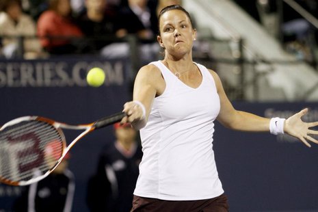 Lindsay Davenport of the U.S. returns a shot to Britain's Sarah Borwell and Raquel Kops-Jones of the U.S. during their Stanford Classic wome Lindsay Davenport of the U.S. returns a shot to Britain's Sarah Borwell and Raquel Kops-Jones of the U.S. during their Stanford Classic wome