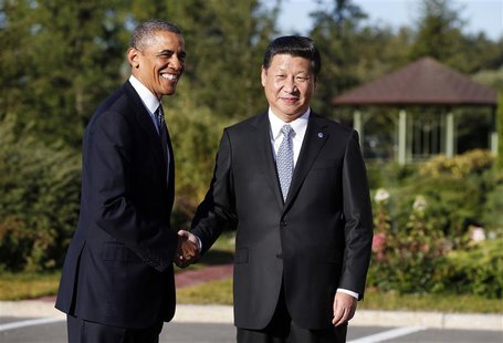 U.S. President Barack Obama shakes hands as he meets with China's President Xi Jinping at the G20 Summit in St. Petersburg September 6, 2013 U.S. President Barack Obama shakes hands as he meets with China's President Xi Jinping at the G20 Summit in St. Petersburg September 6, 2013