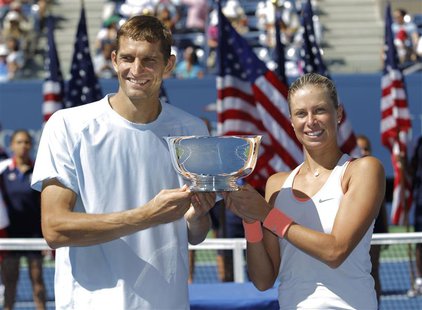 Andrea Hlavackova of the Czech Republic and Max Mirnyi of Belarus pose with their trophy after defeating Abigail Spears of the U.S. and Sant Andrea Hlavackova of the Czech Republic and Max Mirnyi of Belarus pose with their trophy after defeating Abigail Spears of the U.S. and Sant