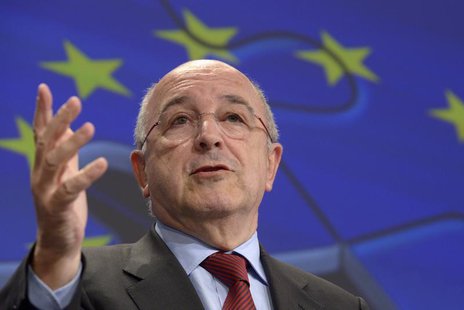 European Union Competition Commissioner Joaquin Almunia gestures during a joint news conference with European Union Commissioner for Interna European Union Competition Commissioner Joaquin Almunia gestures during a joint news conference with European Union Commissioner for Interna
