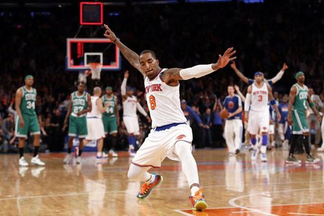 New York Knicks' J.R. Smith celebrates after sinking a three point basket at the buzzer at the end of the first quarter against the Boston C New York Knicks' J.R. Smith celebrates after sinking a three point basket at the buzzer at the end of the first quarter against the Boston C