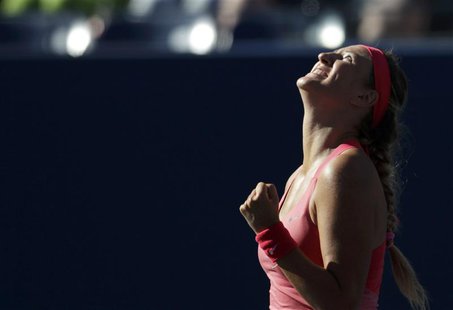 Victoria Azarenka of Belarus celebrates winning match point against Flavia Pennetta of Italy at the U.S. Open tennis championships in New Yo Victoria Azarenka of Belarus celebrates winning match point against Flavia Pennetta of Italy at the U.S. Open tennis championships in New Yo
