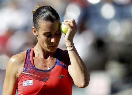 Flavia Pennetta of Italy reacts to a missed point against Victoria Azarenka of Belarus at the U.S. Open tennis championships in New York Sep Flavia Pennetta of Italy reacts to a missed point against Victoria Azarenka of Belarus at the U.S. Open tennis championships in New York Sep