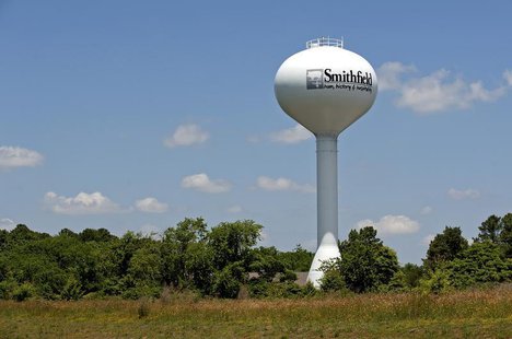 A water tower with the town slogan "ham, history and hospitality" rises over Smithfield, Virginia May 30, 2013. REUTERS/Rich-Joseph Facun A water tower with the town slogan "ham, history and hospitality" rises over Smithfield, Virginia May 30, 2013. REUTERS/Rich-Joseph Facun