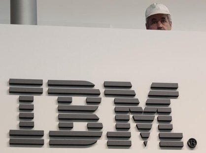 A worker is pictured behind a logo at the IBM stand on the CeBIT computer fair in Hanover February 26, 2011. REUTERS/Tobias Schwarz A worker is pictured behind a logo at the IBM stand on the CeBIT computer fair in Hanover February 26, 2011. REUTERS/Tobias Schwarz