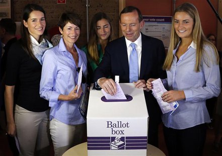 Tony Abbott (2nd R), who leads the conservative opposition, casts his vote as his wife Margaret and daughters Louise, Frances and Bridget (L Tony Abbott (2nd R), who leads the conservative opposition, casts his vote as his wife Margaret and daughters Louise, Frances and Bridget (L