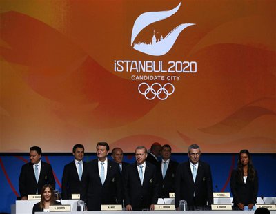 Members of the Istanbul 2020 delegation greet members of the International Olympic Committee (IOC) as they begin their presentation as a can Members of the Istanbul 2020 delegation greet members of the International Olympic Committee (IOC) as they begin their presentation as a can