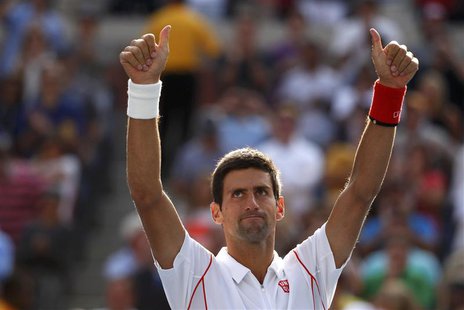 Novak Djokovic of Serbia celebrates after defeating Stanislas Wawrinka of Switzerland during their men's semi-final match at the U.S. Open t Novak Djokovic of Serbia celebrates after defeating Stanislas Wawrinka of Switzerland during their men's semi-final match at the U.S. Open t