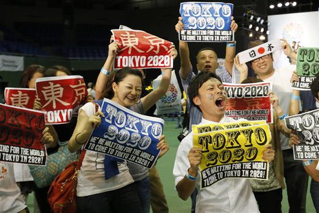 People celebrate after hearing that Tokyo had been chosen to host the 2020 Olympic Games during a public viewing event in Tokyo September 8, People celebrate after hearing that Tokyo had been chosen to host the 2020 Olympic Games during a public viewing event in Tokyo September 8,