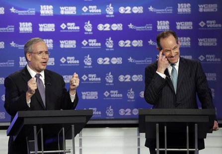 Manhattan borough president Scott Stringer (L) and former New York Governor Eliot Spitzer, both Democrats, participate in a primary debate f Manhattan borough president Scott Stringer (L) and former New York Governor Eliot Spitzer, both Democrats, participate in a primary debate f