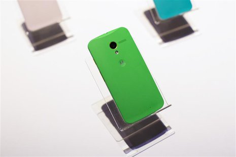Different colored examples of Motorola's new Moto X phones rest on a table at a launch event in New York, in this August 1, 2013, file photo Different colored examples of Motorola's new Moto X phones rest on a table at a launch event in New York, in this August 1, 2013, file photo