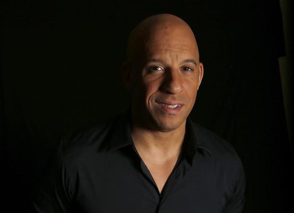 Actor Vin Diesel poses for a portrait while promoting his upcoming movie "Riddick" in Los Angeles, California August 27, 2013. REUTERS/Mario Actor Vin Diesel poses for a portrait while promoting his upcoming movie "Riddick" in Los Angeles, California August 27, 2013. REUTERS/Mario