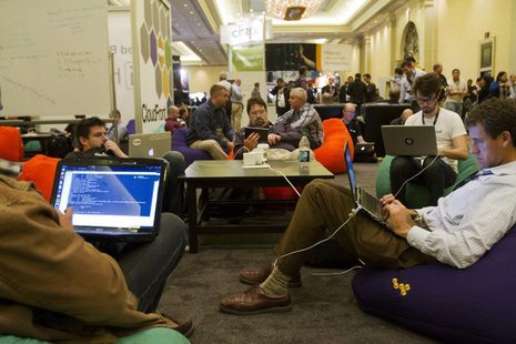 Developers and programmers participate in a coding challenge at the AWS Re:Invent conference at the Sands Expo in Las Vegas Nevada Nov. 28, Developers and programmers participate in a coding challenge at the AWS Re:Invent conference at the Sands Expo in Las Vegas Nevada Nov. 28,