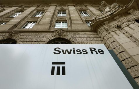The logo of the world's second biggest reinsurer Swiss Re is seen in front of the company's headquarters in Zurich July 8, 2013. REUTERS/Arn The logo of the world's second biggest reinsurer Swiss Re is seen in front of the company's headquarters in Zurich July 8, 2013. REUTERS/Arn