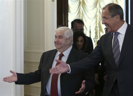 Russia's Foreign Minister Sergei Lavrov (R) shows the way to his Syrian counterpart Walid Moualem during a meeting in Moscow September 9, 20 Russia's Foreign Minister Sergei Lavrov (R) shows the way to his Syrian counterpart Walid Moualem during a meeting in Moscow September 9, 20