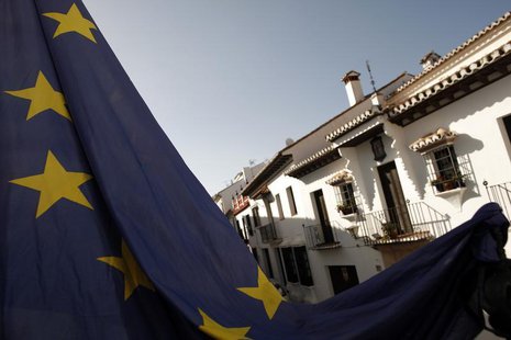 The European Union flag hangs from a balcony of a senior citizens' recreation centre in the Andalusian city of Ronda, near Malaga, southern The European Union flag hangs from a balcony of a senior citizens' recreation centre in the Andalusian city of Ronda, near Malaga, southern