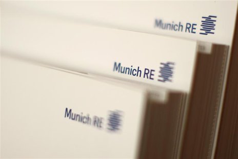 File photo of books of world's biggest reinsurer, Munich RE (Muenchener Rueck) pictured in a Munich Re office building in Munich November 5, File photo of books of world's biggest reinsurer, Munich RE (Muenchener Rueck) pictured in a Munich Re office building in Munich November 5,
