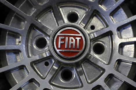 A Fiat logo is seen on the wheel of a Fiat car in Turin in this picture taken February 10, 2013. REUTERS/Stefano Rellandini A Fiat logo is seen on the wheel of a Fiat car in Turin in this picture taken February 10, 2013. REUTERS/Stefano Rellandini