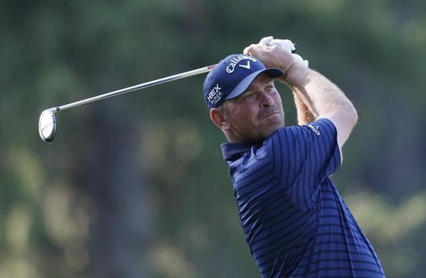 Denmark's Thomas Bjorn tees off on the 11th hole during the first round of the 2013 PGA Championship golf tournament at Oak Hill Country Clu Denmark's Thomas Bjorn tees off on the 11th hole during the first round of the 2013 PGA Championship golf tournament at Oak Hill Country Clu
