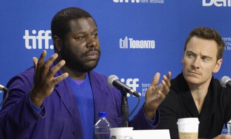 Actor Michael Fassbender (R) and director Steve McQueen attend a news conference for the film "12 Years A Slave" at the 38th Toronto Interna Actor Michael Fassbender (R) and director Steve McQueen attend a news conference for the film "12 Years A Slave" at the 38th Toronto Interna