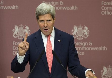 U.S. Secretary of State John Kerry gestures during his joint news conference with Britain's Foreign Secretary William Hague at the Foreign a U.S. Secretary of State John Kerry gestures during his joint news conference with Britain's Foreign Secretary William Hague at the Foreign a