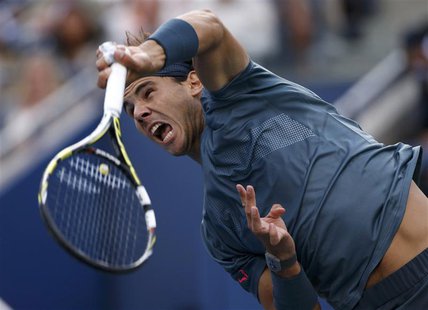 Rafael Nadal of Spain serves to Novak Djokovic of Serbia in their men's final match at the U.S. Open tennis championships in New York, Septe Rafael Nadal of Spain serves to Novak Djokovic of Serbia in their men's final match at the U.S. Open tennis championships in New York, Septe