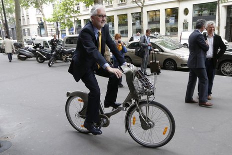 British Cycling President Brian Cookson rides a Velib self-service public bicycle during a photo session after a news conference in Paris Ju British Cycling President Brian Cookson rides a Velib self-service public bicycle during a photo session after a news conference in Paris Ju