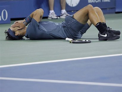 Rafael Nadal of Spain celebrates after defeating Novak Djokovic of Serbia in their men's final match at the U.S. Open tennis championships i Rafael Nadal of Spain celebrates after defeating Novak Djokovic of Serbia in their men's final match at the U.S. Open tennis championships i