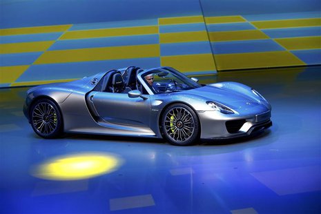 Porsche CEO, Matthias Mueller presents the new Porsche 918 Spyder hybrid car at the Volkswagen group night at the Frankfurt motor show Septe Porsche CEO, Matthias Mueller presents the new Porsche 918 Spyder hybrid car at the Volkswagen group night at the Frankfurt motor show Septe