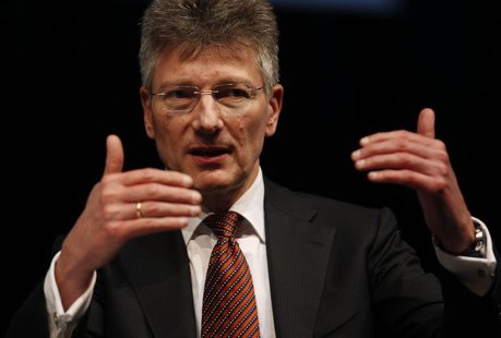 Elmar Degenhart, CEO of Germany's Continental AG speaks during the 'International CAR Symposium' in Bochum January 29, 2013. REUTERS/Ina Fas Elmar Degenhart, CEO of Germany's Continental AG speaks during the 'International CAR Symposium' in Bochum January 29, 2013. REUTERS/Ina Fas