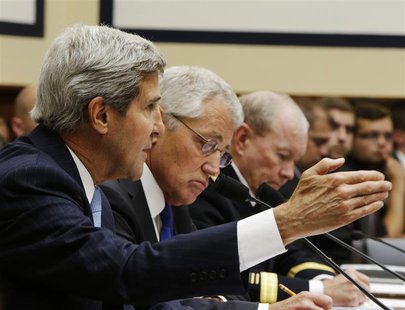 U.S. Secretary of State John Kerry (L-R), Defense Secretary Chuck Hagel and Chairman of the Joint Chiefs of Staff U.S. Army General Martin D U.S. Secretary of State John Kerry (L-R), Defense Secretary Chuck Hagel and Chairman of the Joint Chiefs of Staff U.S. Army General Martin D