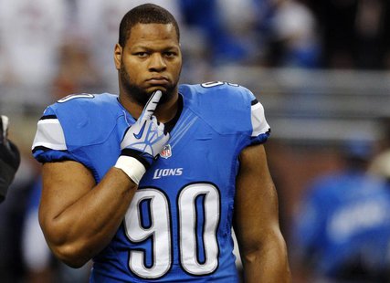 Detroit Lions defensive tackle Ndamukong Suh stands on the field during warms-ups of their NFL football game against the Chicago Bears in De Detroit Lions defensive tackle Ndamukong Suh stands on the field during warms-ups of their NFL football game against the Chicago Bears in De